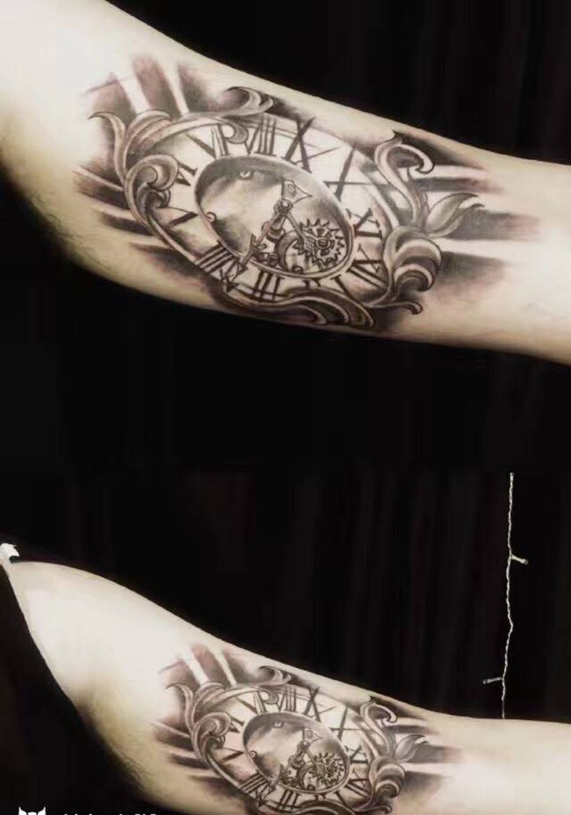 大臂内侧时钟纹身图片_成品手臂欧美写实原创纹身图案