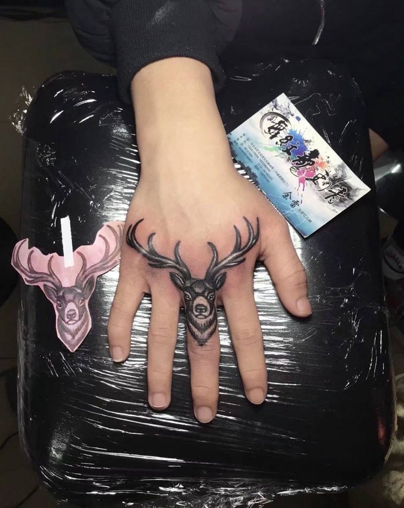 鹿纹身图片_手部老传统纹身图案