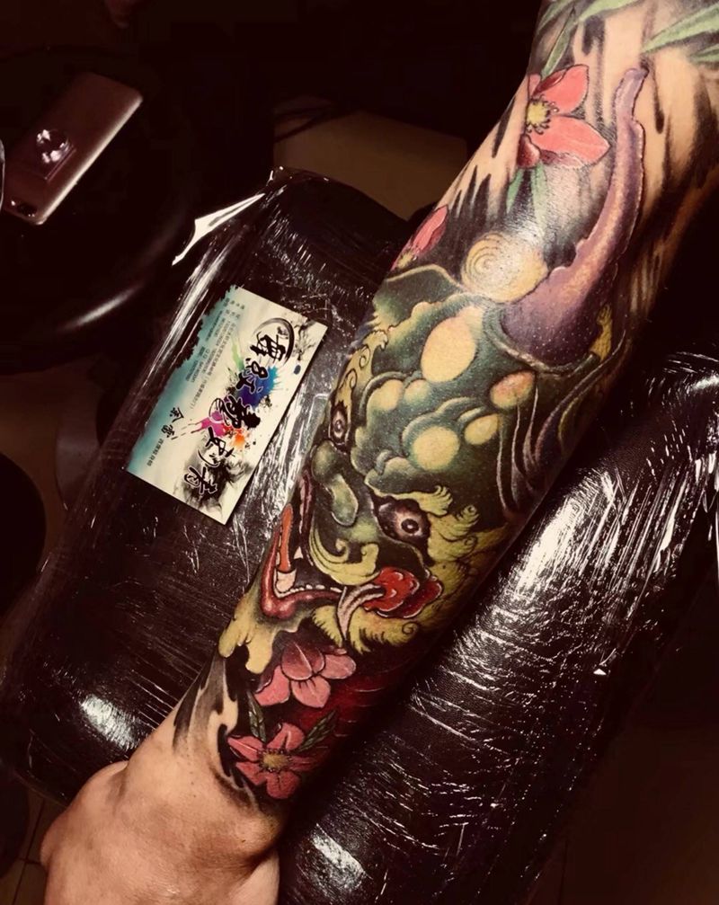 唐狮纹身图片_手臂传统动物鬼神纹身图案