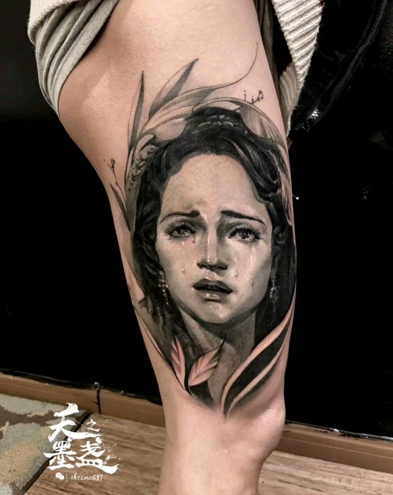圣母像纹身图片_腿部欧美写实宗教纹身图案