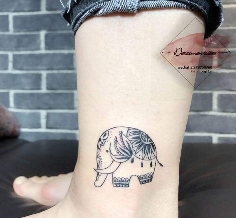 象神纹身图片_成品腿部欧美清新几何动物宗教纹身图案