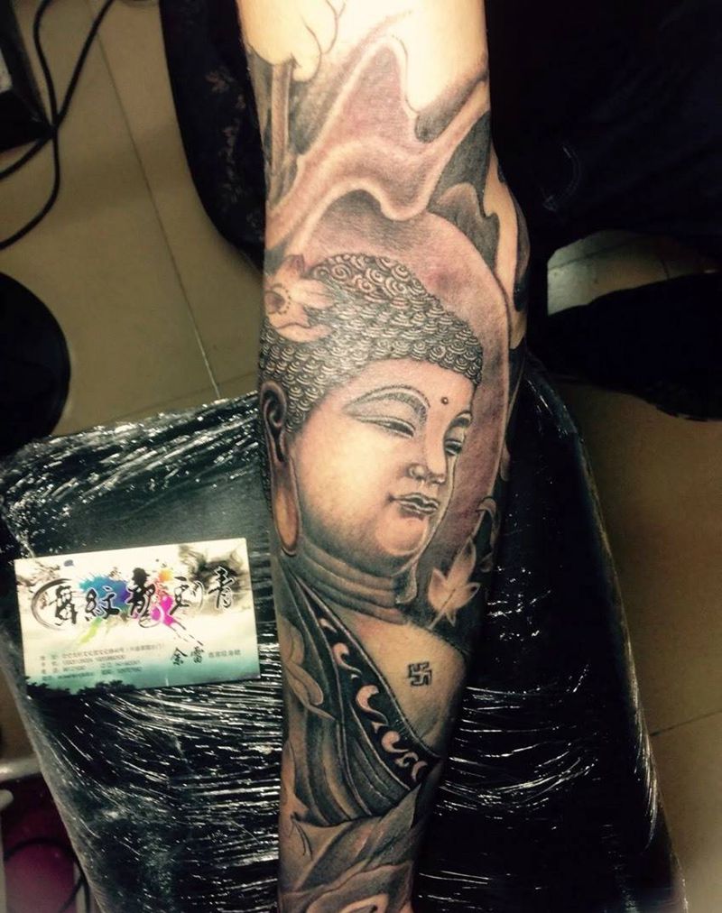 花臂纹身图片_手臂传统宗教纹身图案