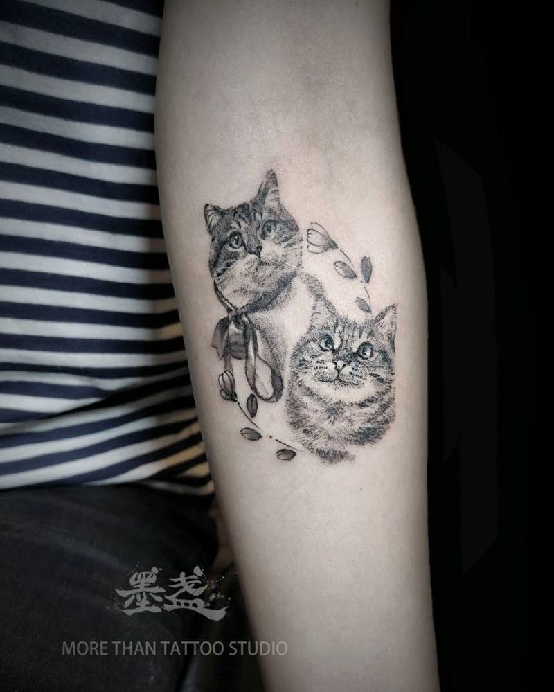 猫猫头纹身图片_手臂点刺宠物纹身图案