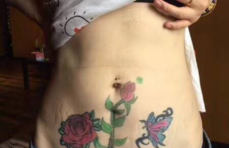 遮盖旧纹身妊辰文和疤痕纹身图片_成品腹部背部胸部欧美遮盖彩色羽毛翅膀纹身图案