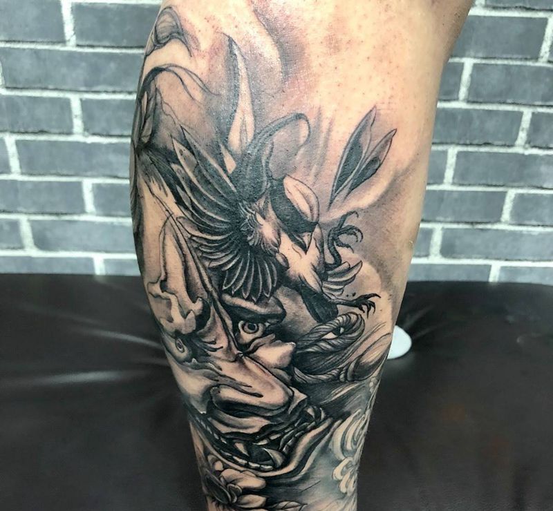 般若纹身图片_成品腿部传统写实肖像动物鬼神纹身图案