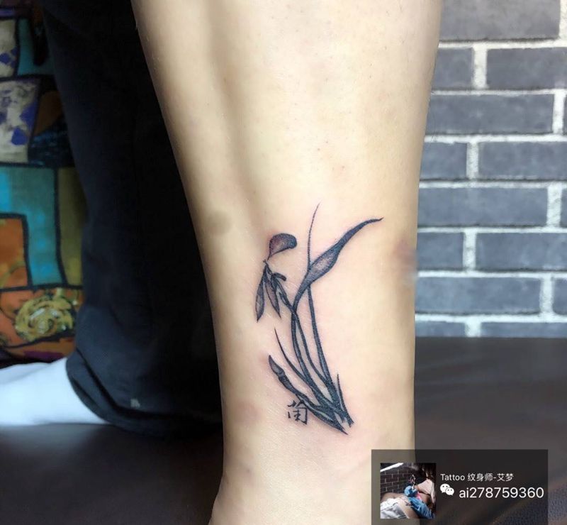 兰纹身图片_成品腿部传统清新植物情侣纹身图案