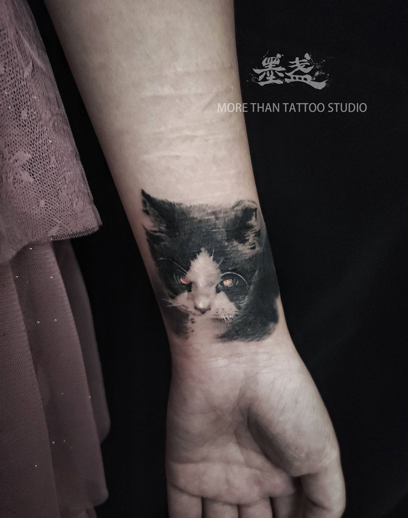 猫猫头纹身图片_手臂欧美写实宠物纹身图案