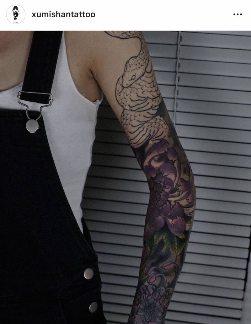 整臂 进度纹身图片_手臂新传统蛇菊花纹身图案