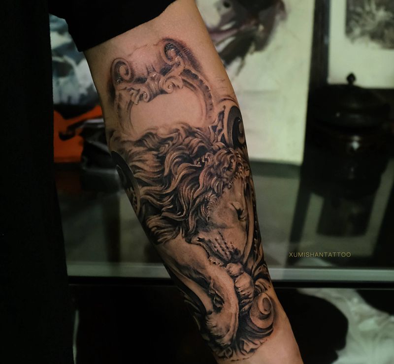 睡狮纹身图片_手臂欧美写实纹身图案