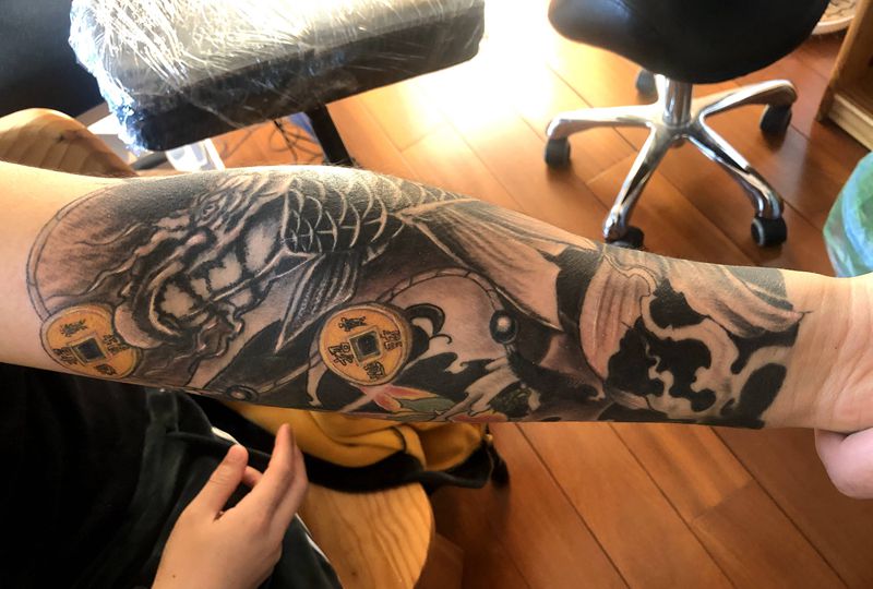 鲫鱼纹身图片_手臂纹身图案