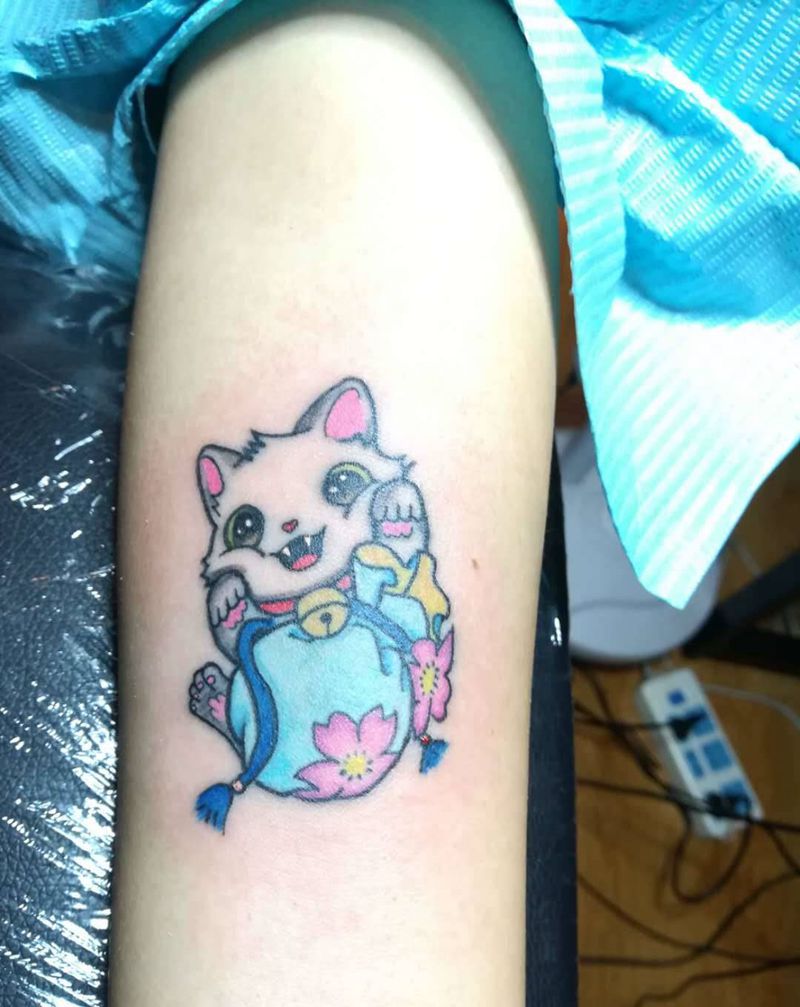 卡通纹身图片_手臂纹身图案