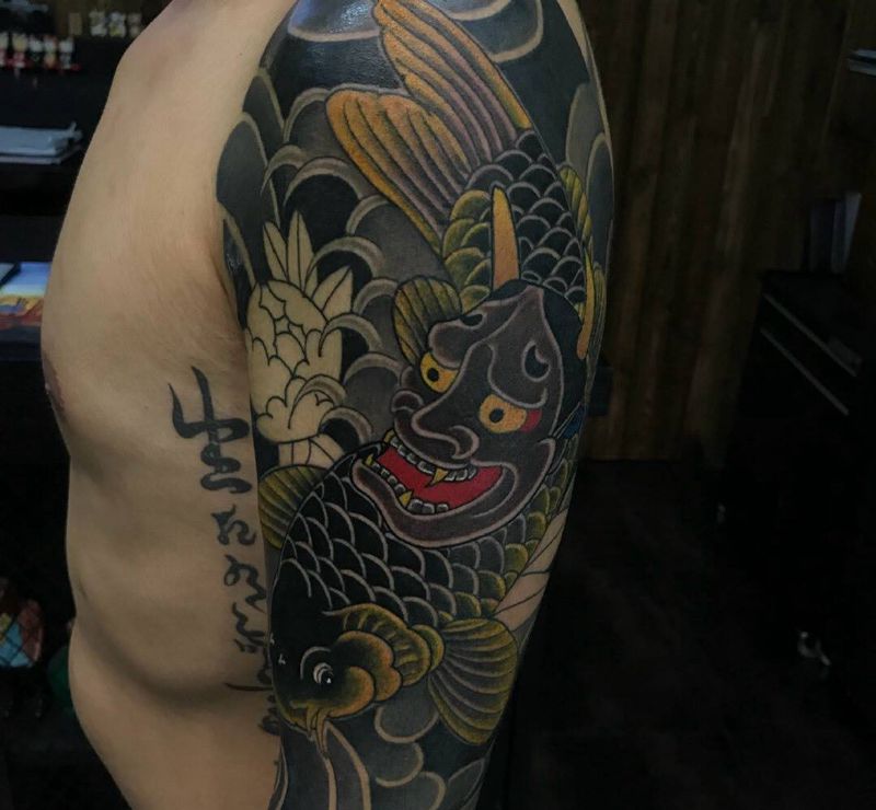 传统鲤鱼七分袖纹身图片_手臂老传统新传统传统鲤鱼传统花臂纹身图案