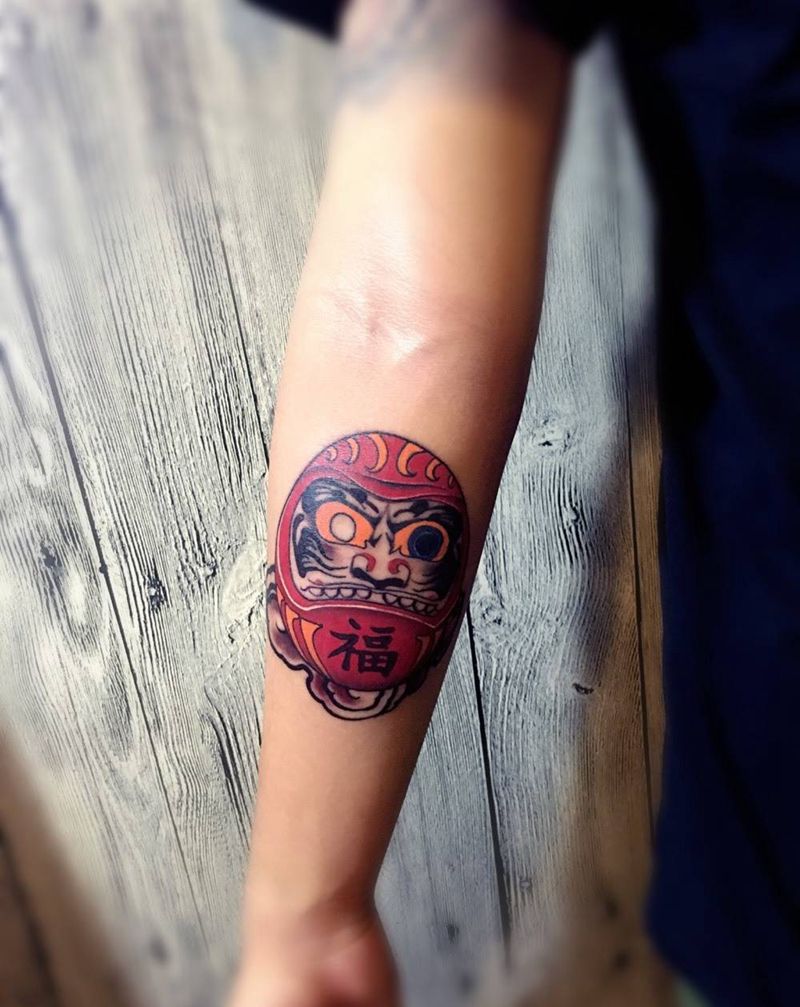 达摩不倒翁纹身图片_成品手臂欧美鬼神宗教纹身图案