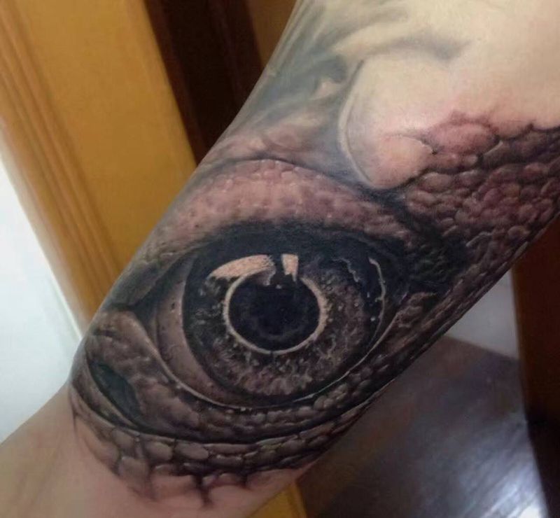 野兽之眼纹身图片_成品手臂手部欧美写实动物原创腿部肩部纹身图案