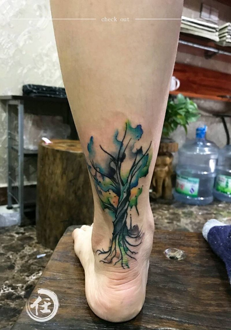 水彩泼墨纹身图片_脚部清新植物成品纹身图案