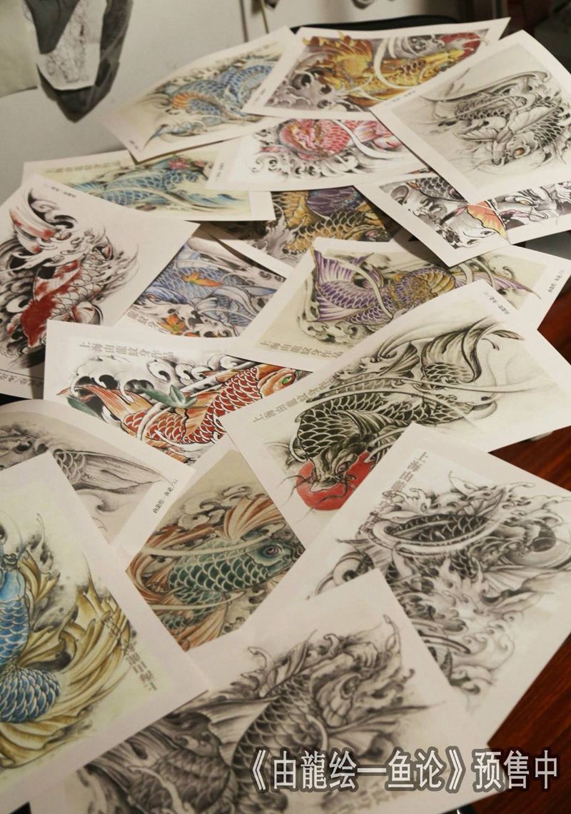 由龙绘--鱼论纹身图片_动物原创手稿肩部手臂传统纹身图案