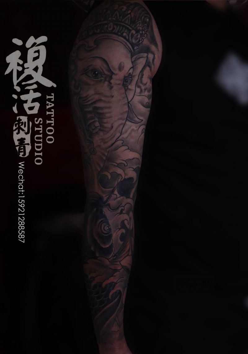 象神包臂纹身图片
