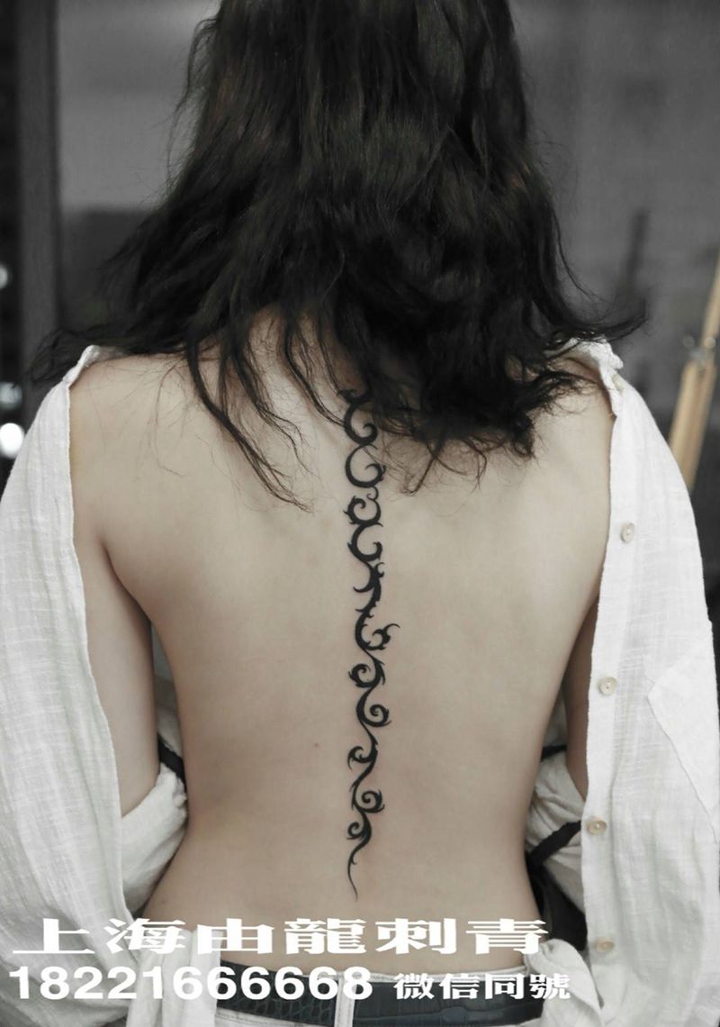 抽象纹身图片_图腾成品背部字符纹身图案