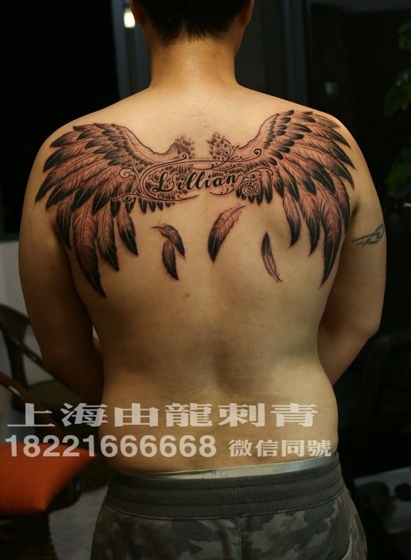翅膀纹身图片_写实纹身图案