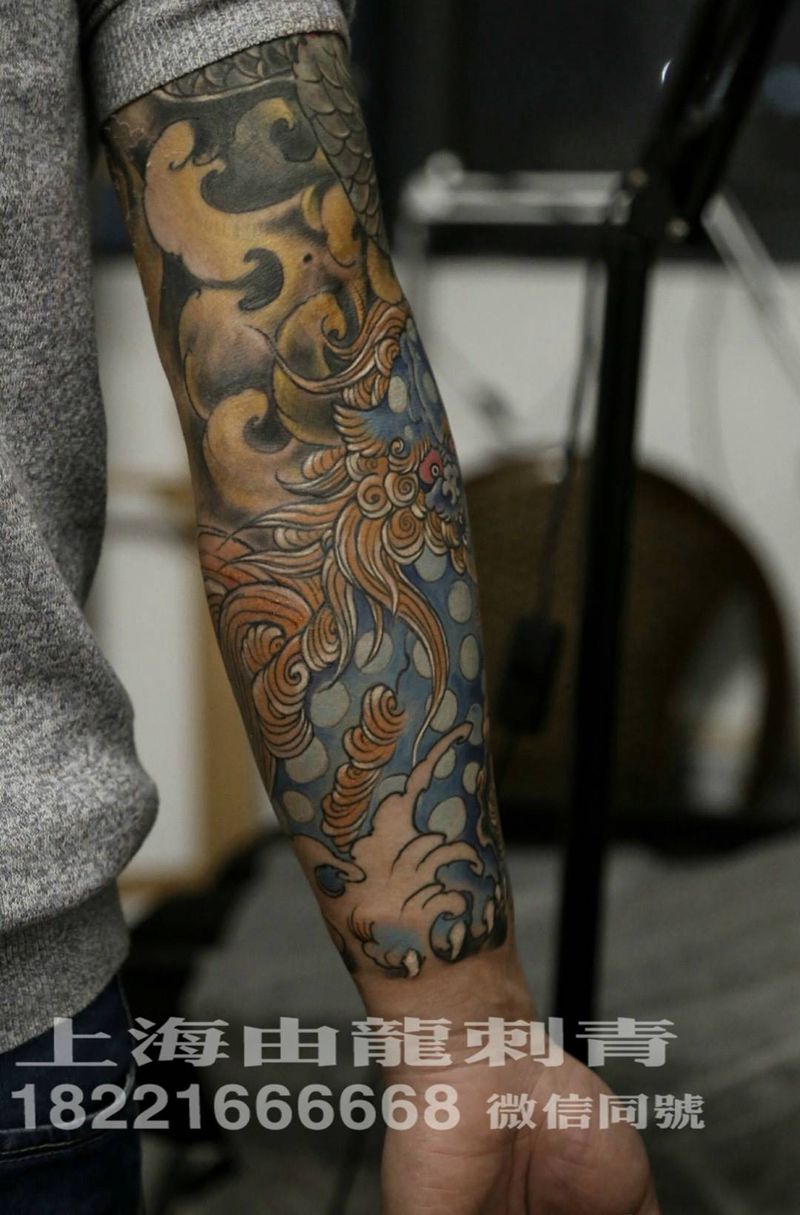 唐狮子纹身图片_动物传统手部手臂纹身图案