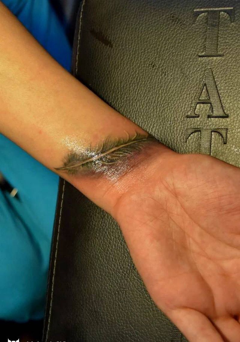 羽毛纹身图片_成品手臂清新静物纹身图案