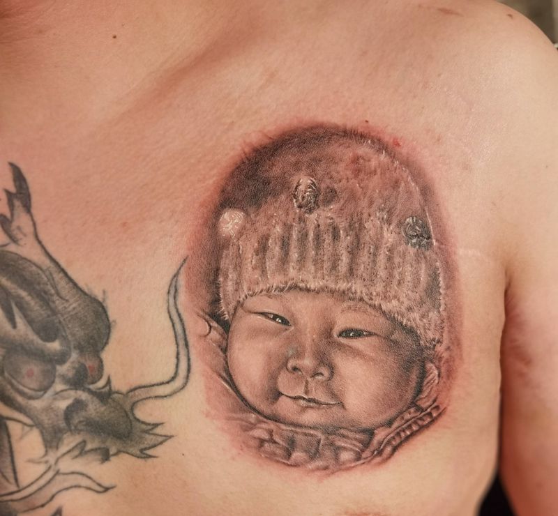 婴儿纹身图片_欧美写实纹身图案