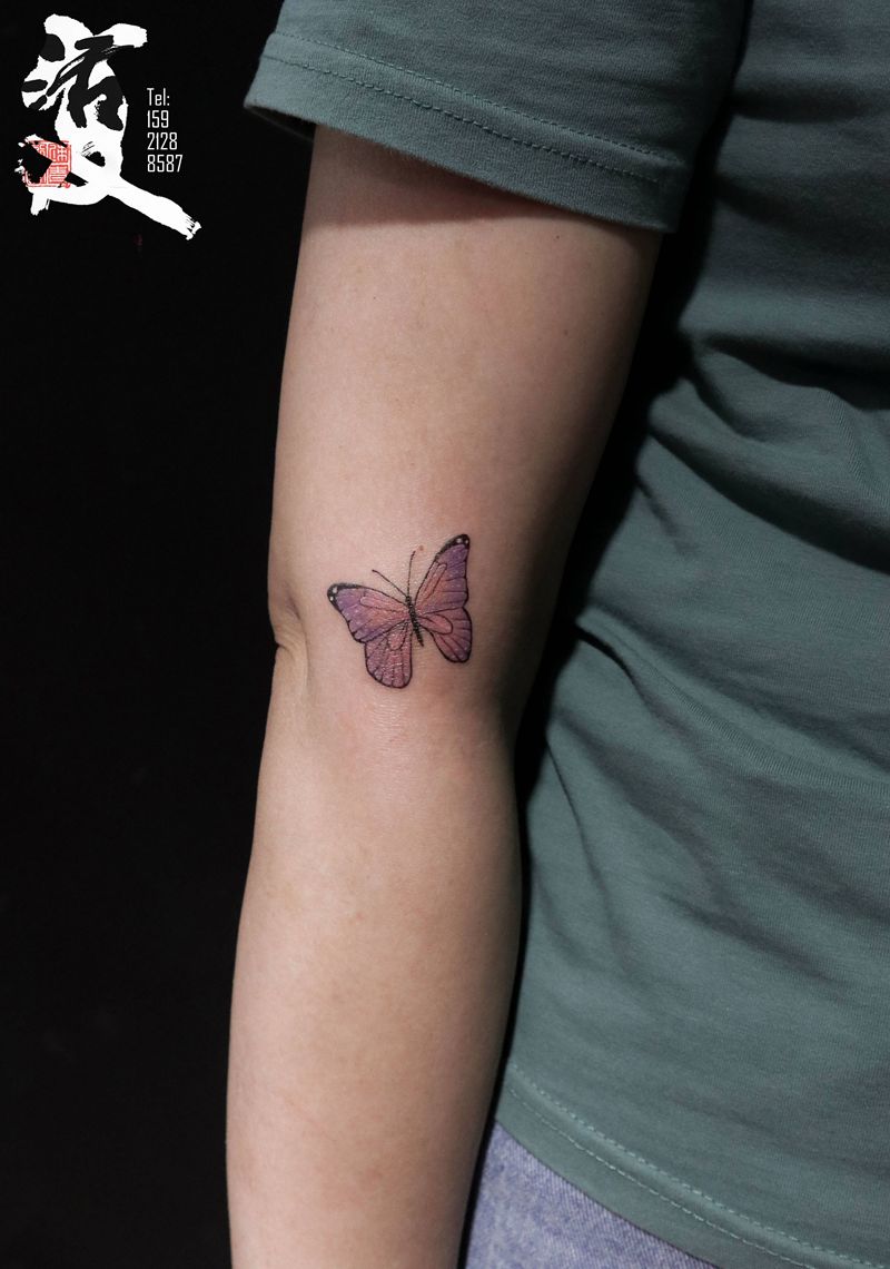 小蝴蝶盖胎记纹身图片_手臂纹身图案