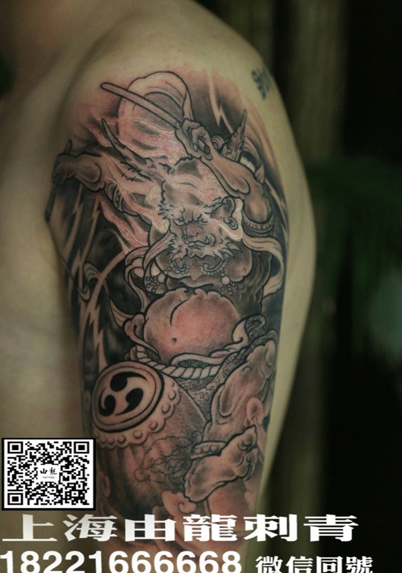 雷哥纹身图片
