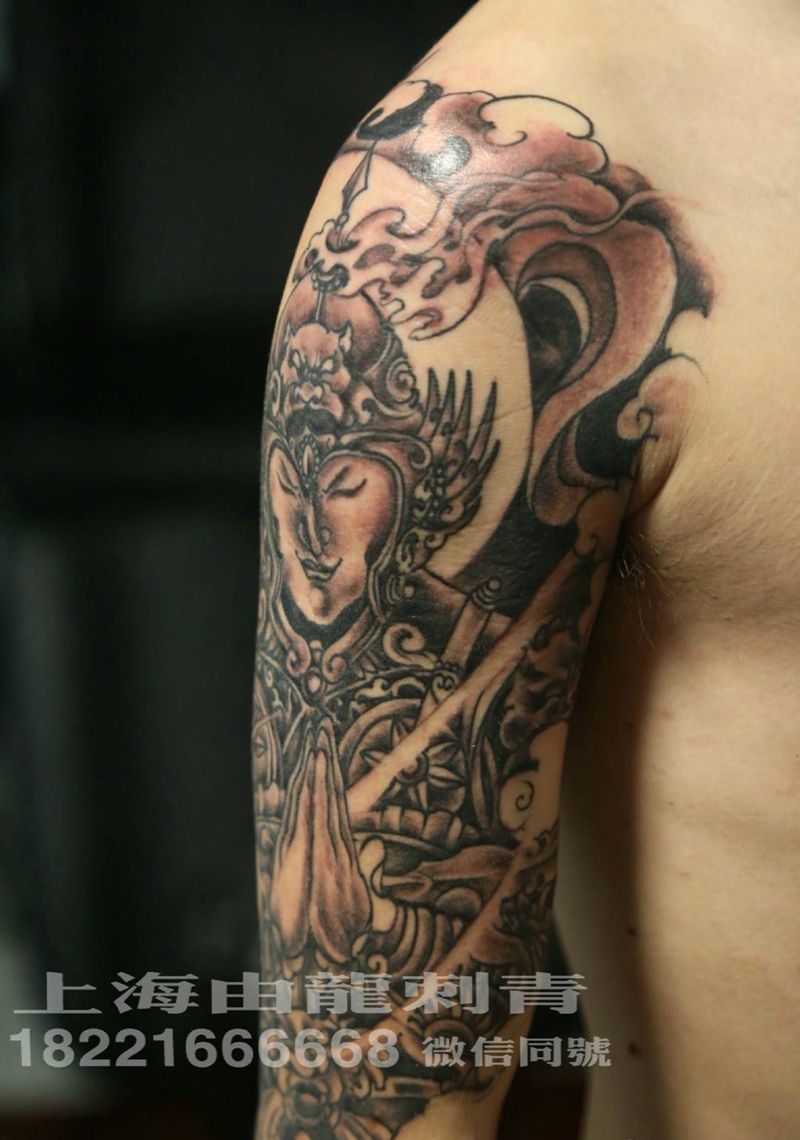 花臂黑灰纹身图片_手臂手部传统人物纹身图案