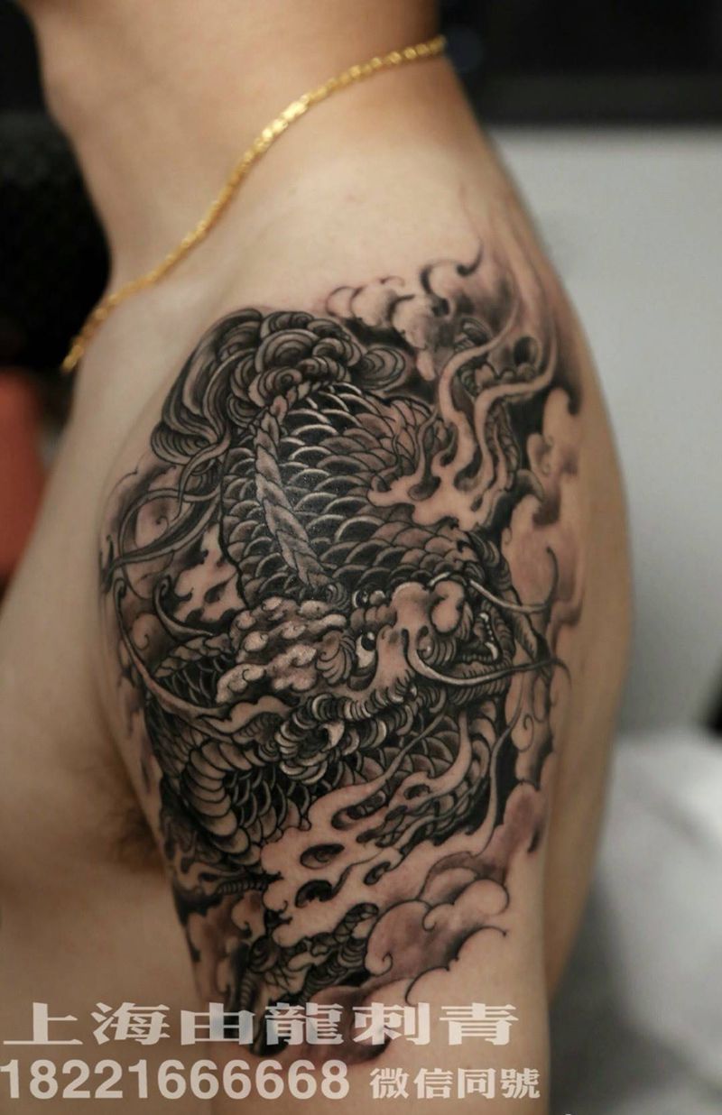 麒麟纹身图片_动物传统手臂纹身图案
