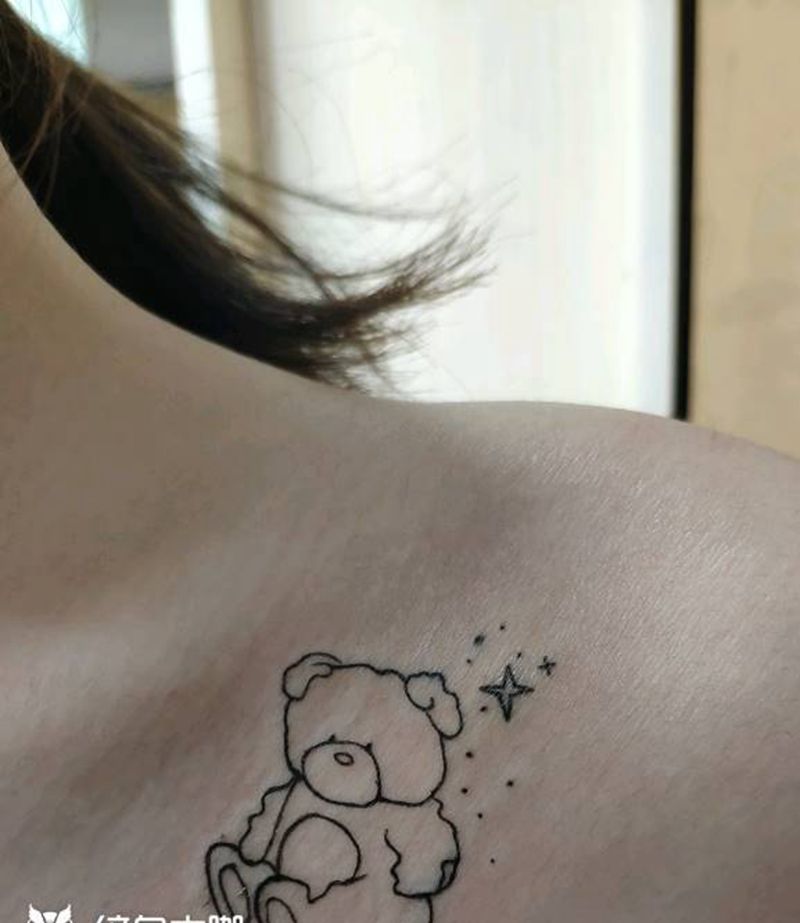 小图一枚纹身图片_胸部纹身图案