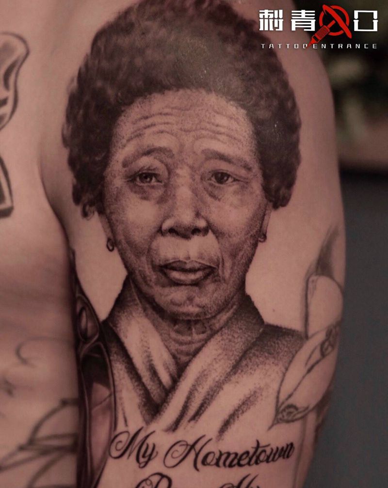 点刺写实肖像纹身图片_手臂点刺肖像写实纹身图案