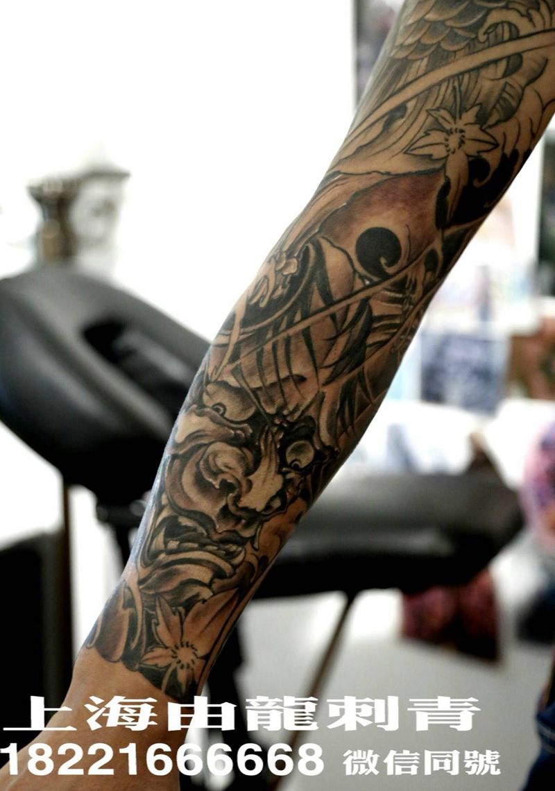 包臂纹身图片_动物手臂传统纹身图案