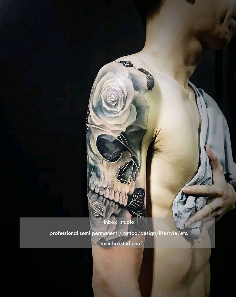 玫瑰骷髅纹身图片_手臂欧美写实新传统纹身图案