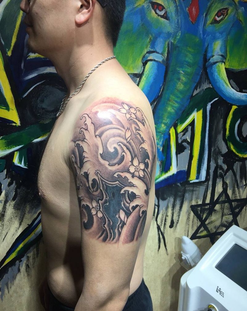 半臂浪花纹身图片_手臂传统原创纹身图案