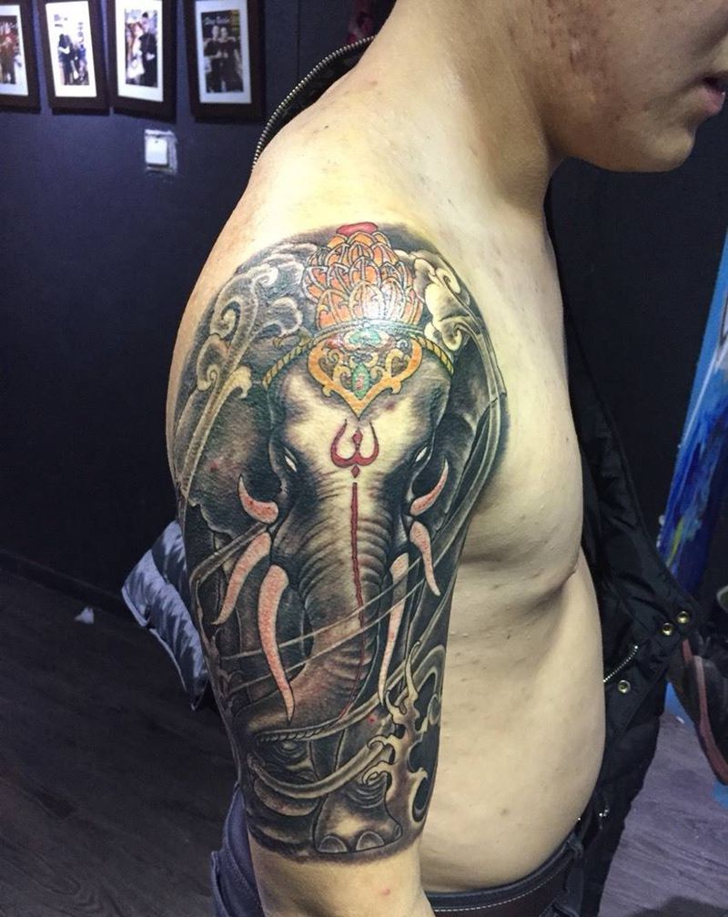 包大臂象神纹身图片