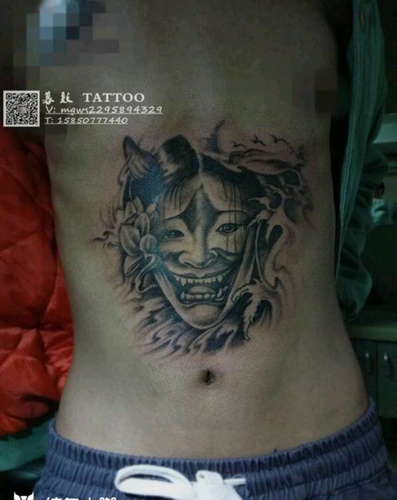这啥?纹身图片_腹部传统鬼神成品纹身图案