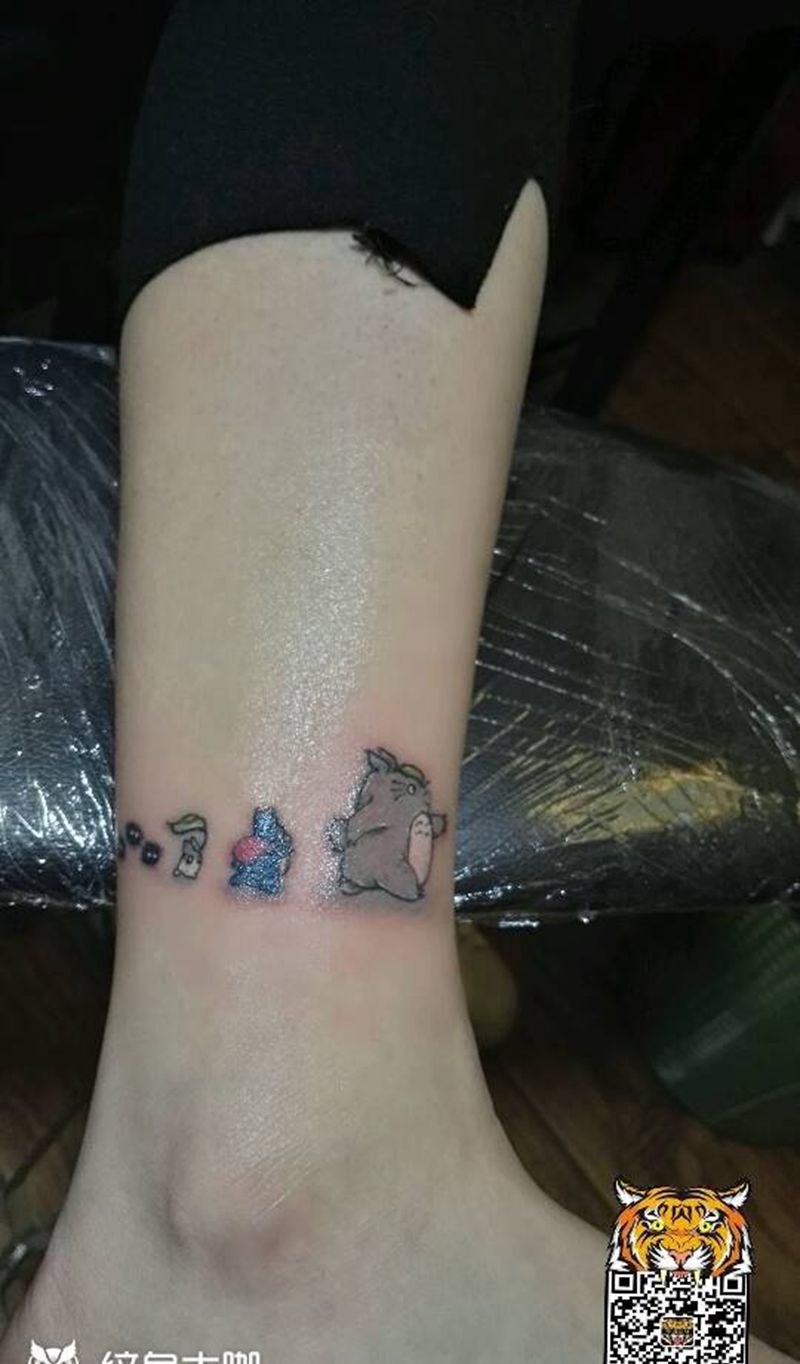 龙猫组合纹身图片_腿部欧美人物成品纹身图案