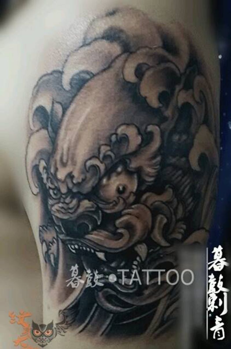 大臂~~唐狮子↘↘纹身图片_手臂传统动物纹身图案