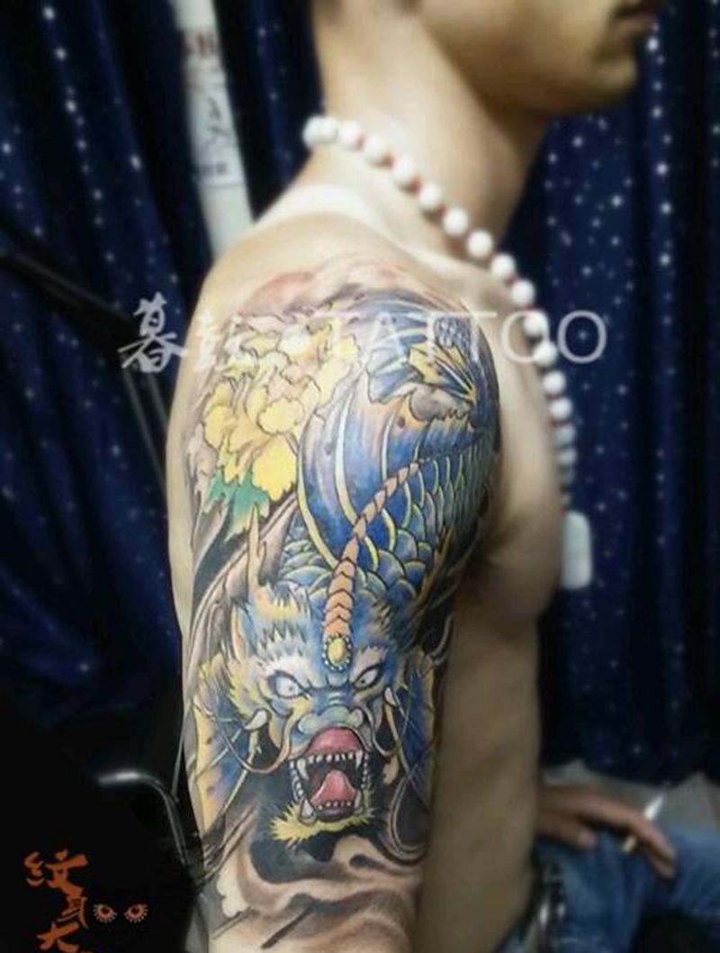 大臂~鳌鱼↘真的汉子纹身图片_手臂传统动物鬼神纹身图案