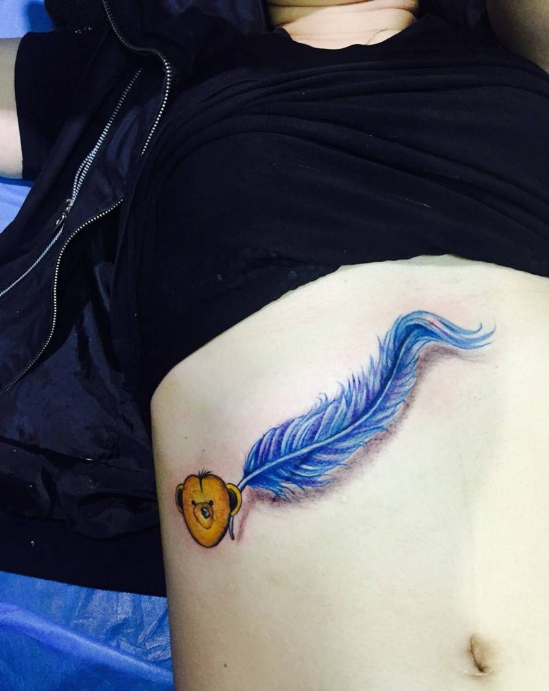 遮盖疤痕羽毛纹身图片