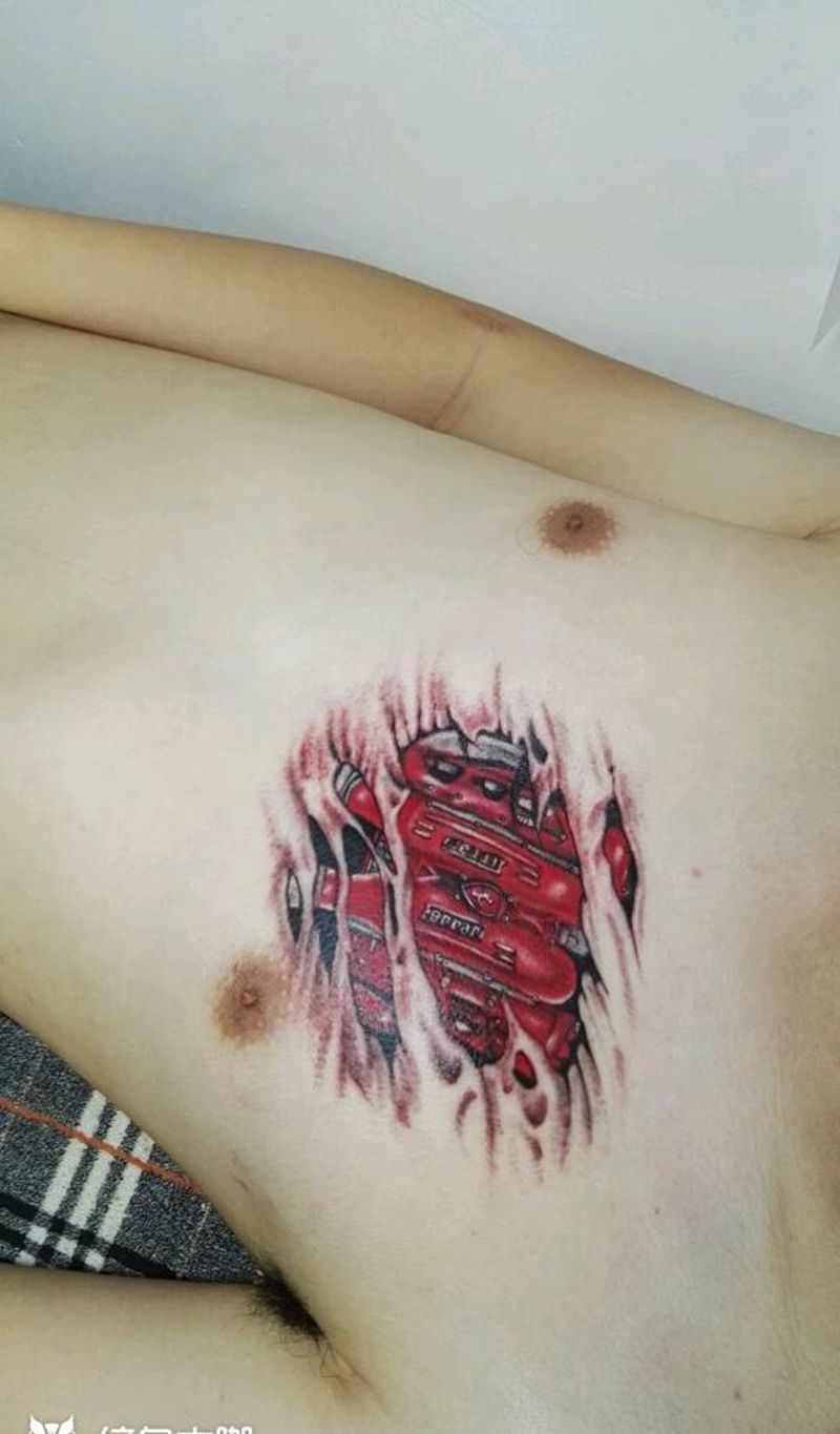 麻药效果！爆裂法拉利引擎纹身图片_胸部欧美几何字符原创成品纹身图案