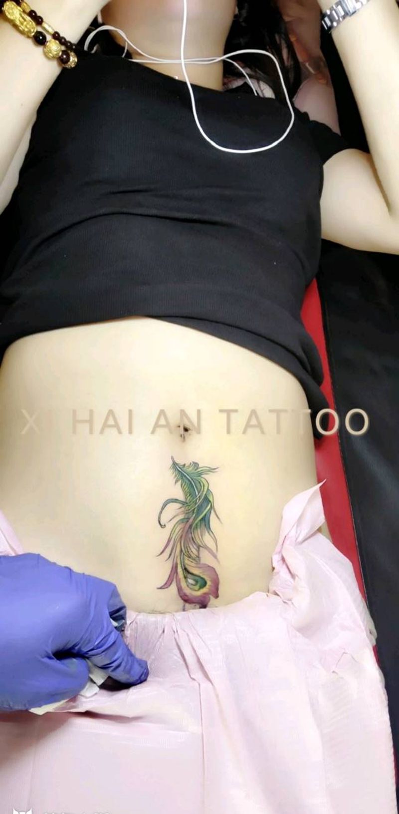 遮盖699元纹身图片_腹部水彩纹身图案