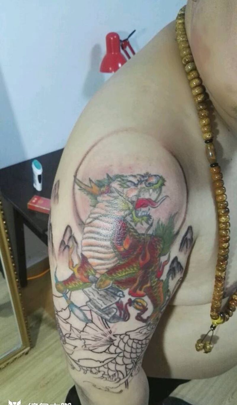 旧纹身修改添加未完成纹身图片_手臂传统动物纹身图案