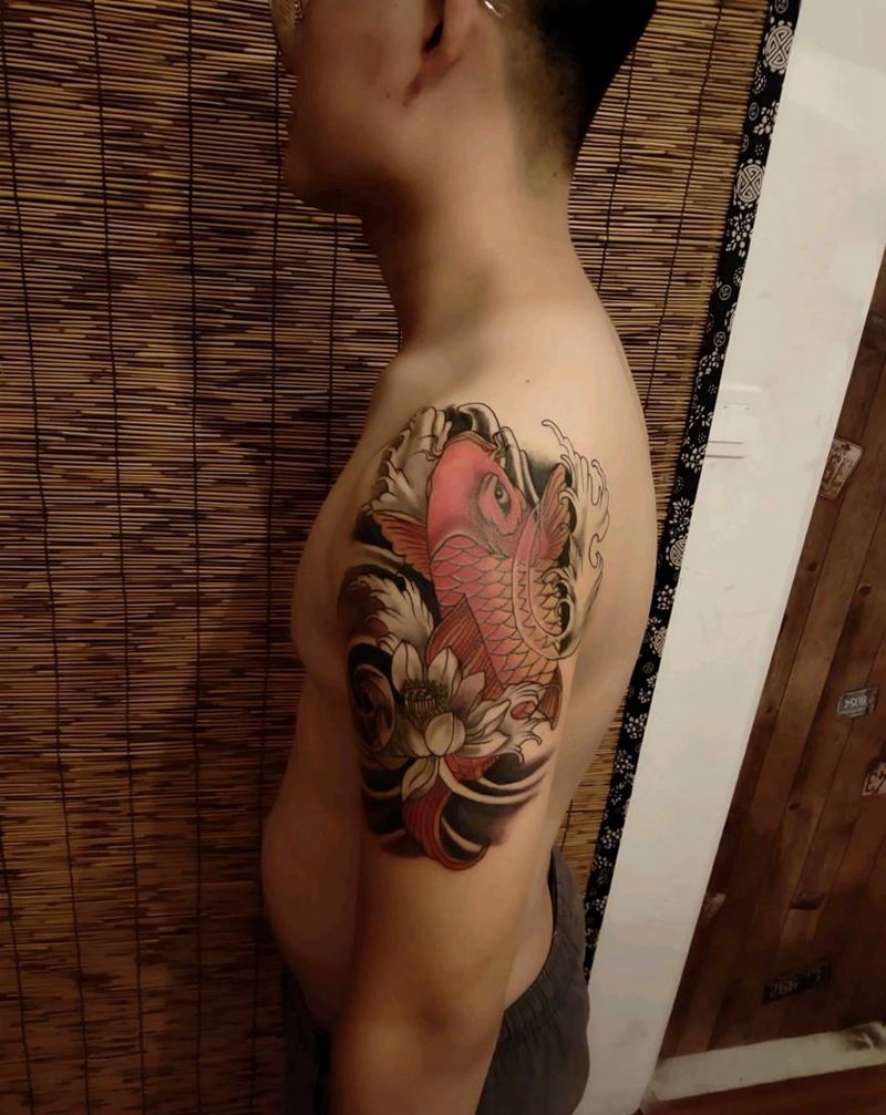 999元大臂鲤鱼纹身图片_手臂新传统纹身图案