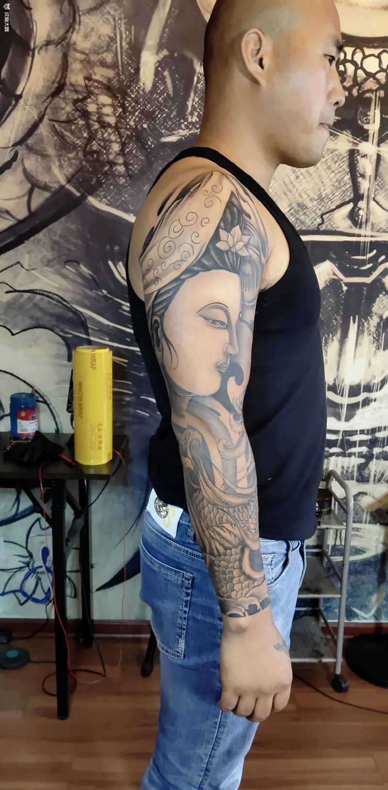 1999元观音花臂纹身图片_手臂新传统纹身图案