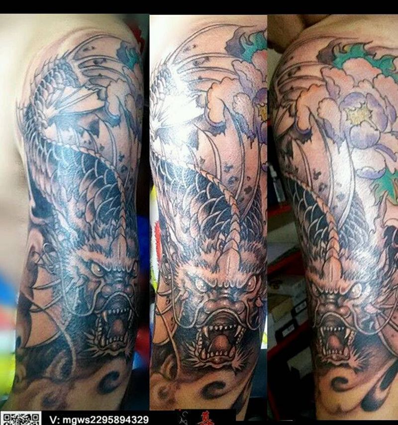 鳌鱼~超能扛造的汉子纹身图片_手臂传统动物纹身图案