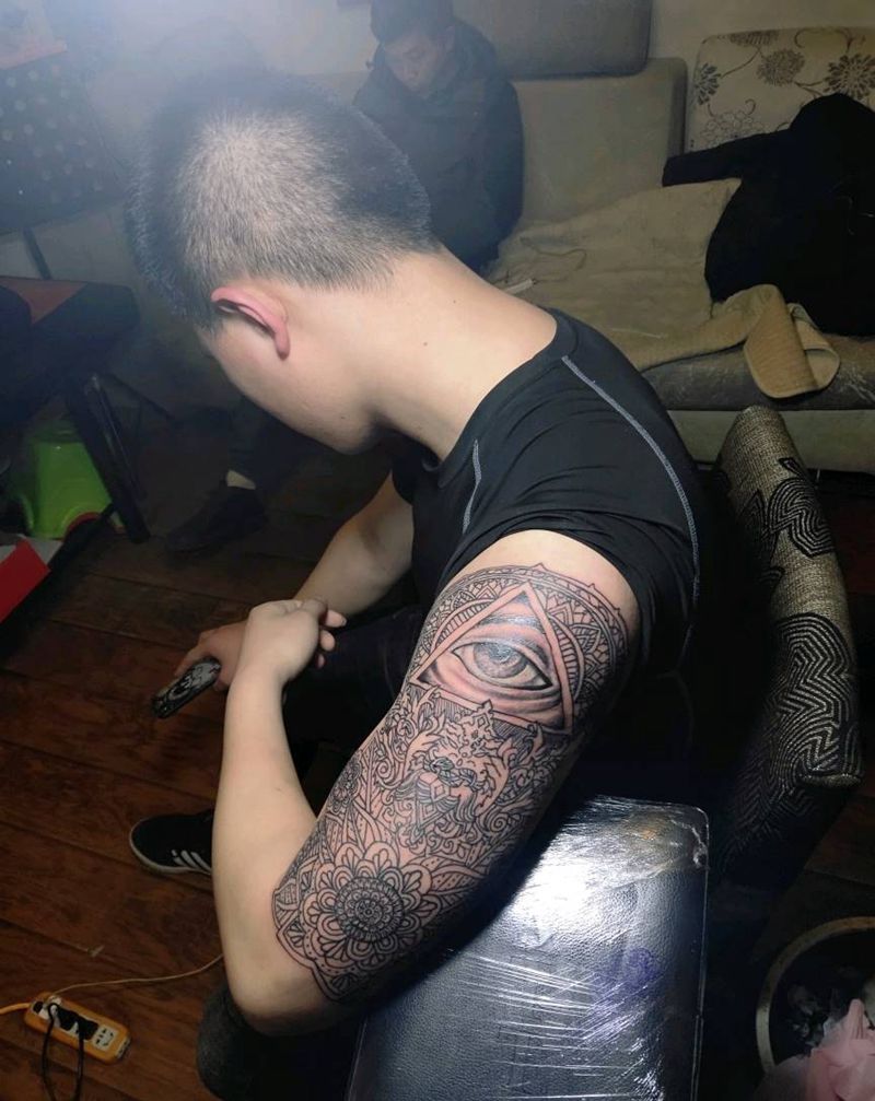 梵花纹身图片_手臂几何图腾纹身图案