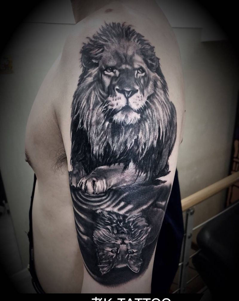 狮子与猫纹身图片_手臂欧美写实纹身图案