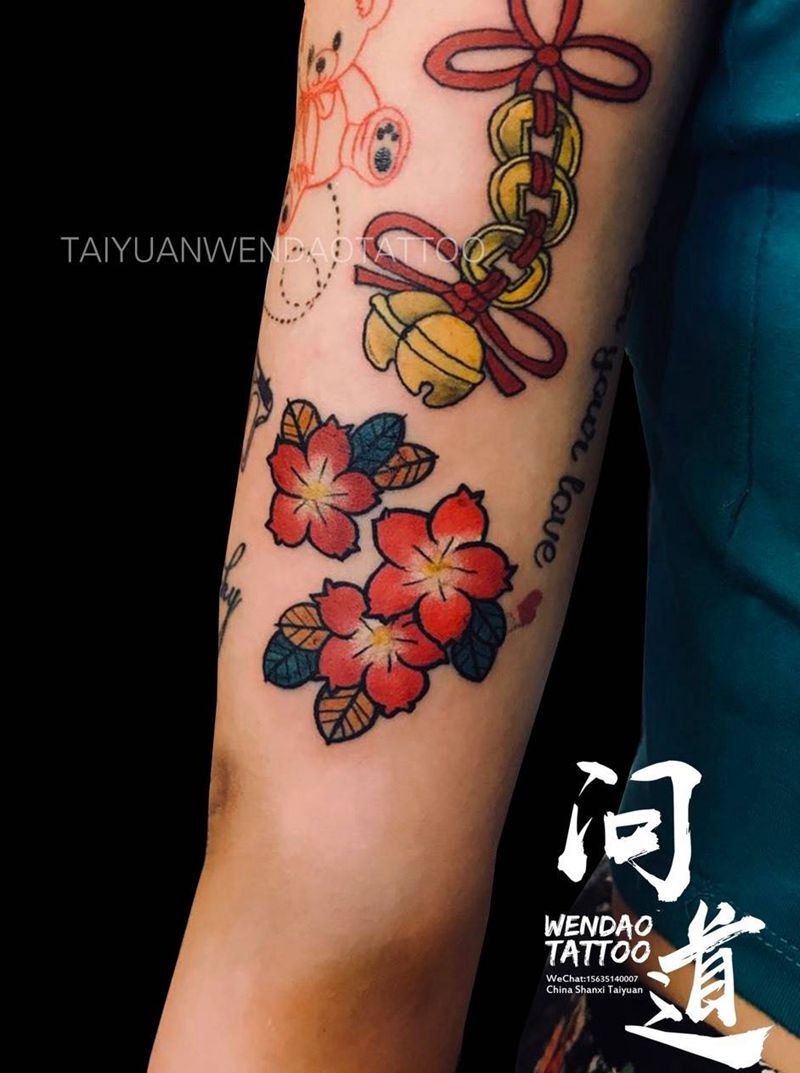 拼接花臂-樱花纹身图片_成品手臂习俗传统清新贴纸植物情侣纹身图案